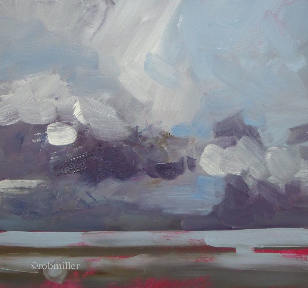 A close up of a painting of a cloudy sky