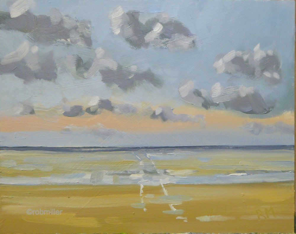 It is a painting of a beach with clouds in the sky.