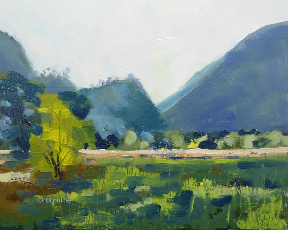 It is a painting of a field with mountains in the background.