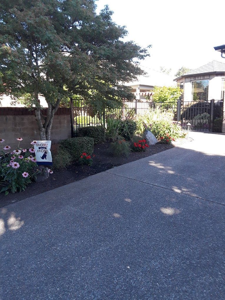 A driveway with a sign that says ' i love you ' on it