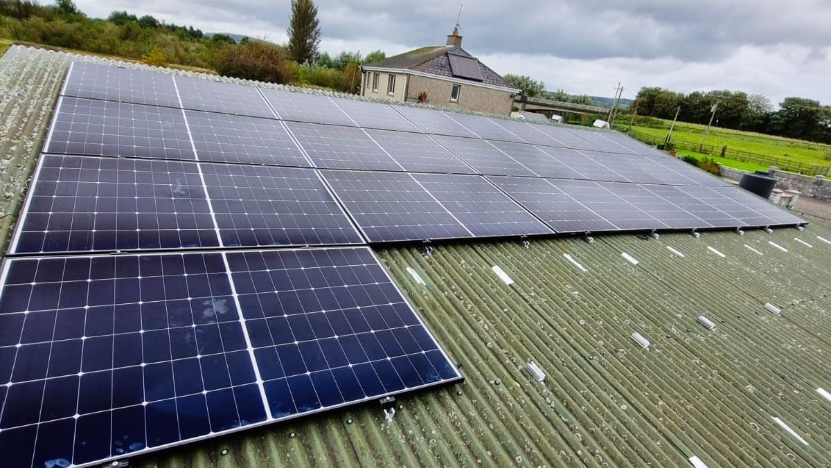 A roof with a lot of solar panels on it