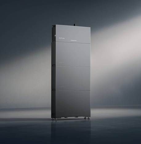 A tall, dark gray energy storage system against a gray background.