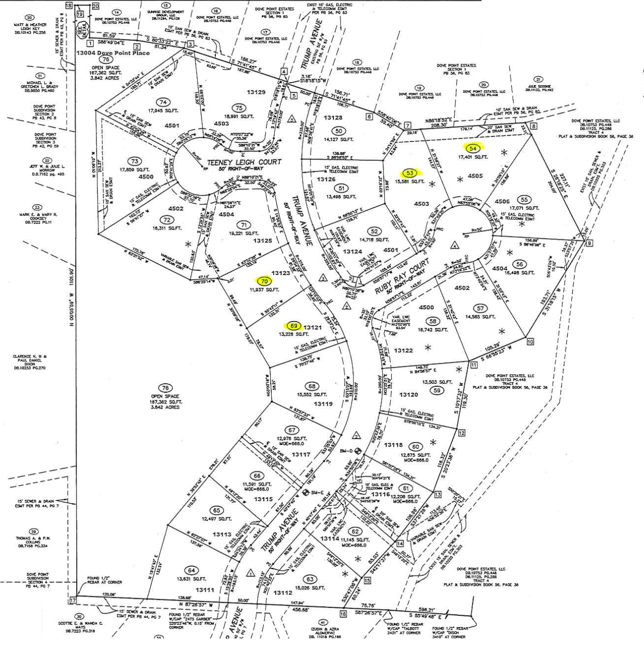 Black-and-white site plan map with labeled lots, roads, and highlighted yellow points.