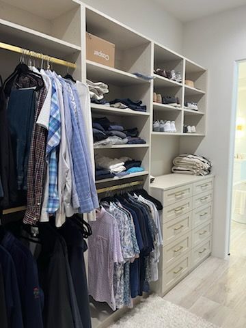 Clothes Inside White Cabinet – Palm Desert, CA – Closets La Quinta & Cabinetry