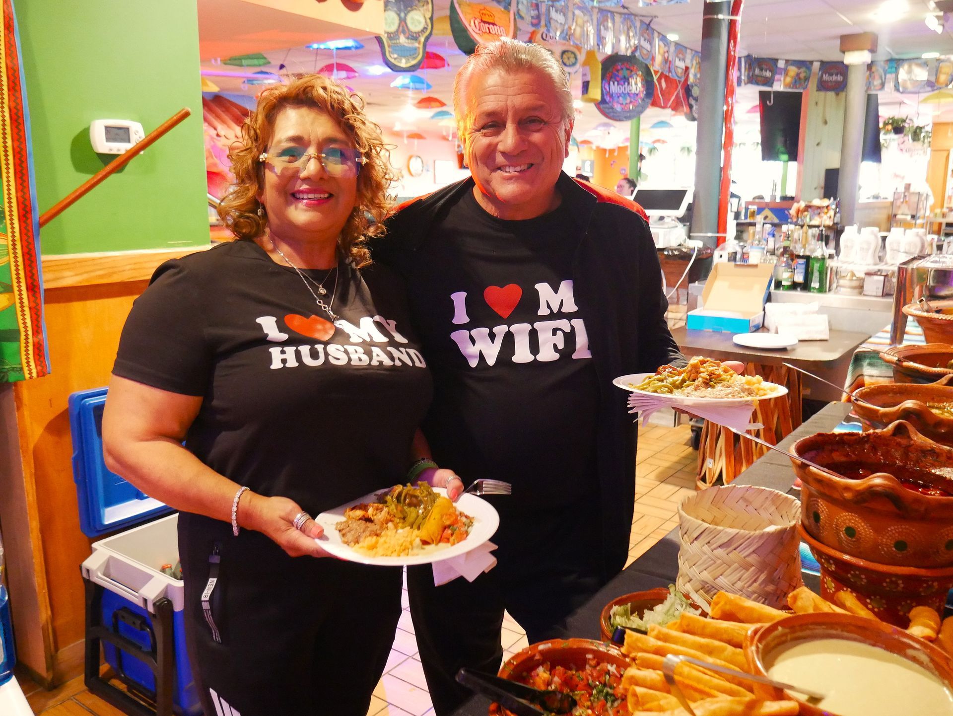 Private party room at Taqueria El Chaparrito featuring authentic Mexican clay cazuelas and traditional serveware 