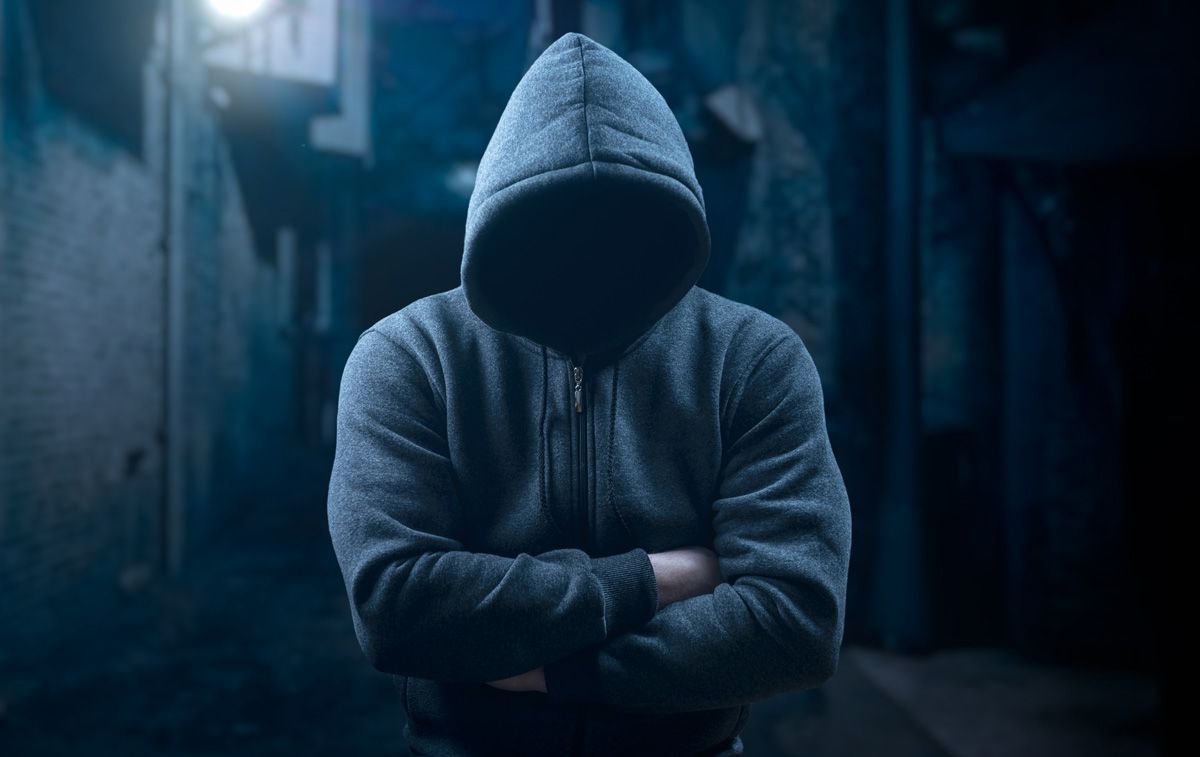 Hooded Man at Night — Yuba City, CA — Law Office of Geoffrey J. Heitman
