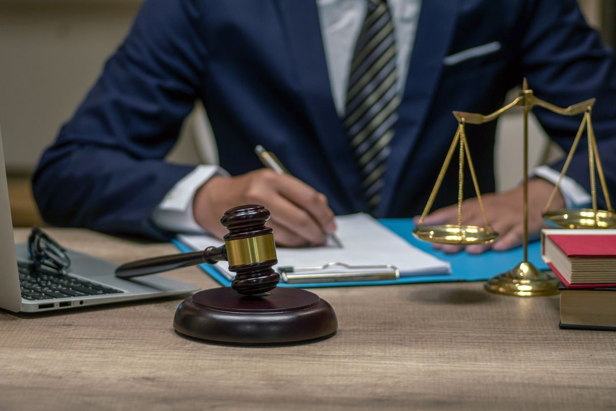 Judge Gavel with Justice Lawyer — Yuba City, CA — Law Office of Geoffrey J. Heitman