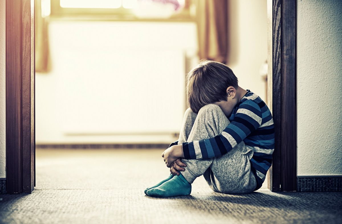 Little Boy Sitting on the Floor — Yuba City, CA — Law Office of Geoffrey J. Heitman