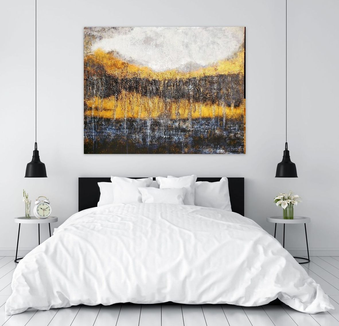 A modern bedroom features a white bed and bedside tables with lamps, centered beneath a large abstract landscape painting.