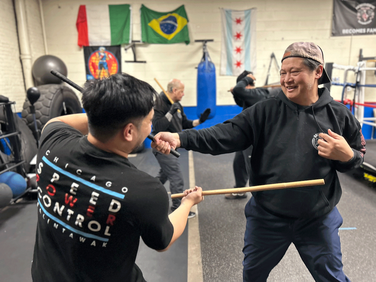 Students enjoying practicing drills in Balintawak martial arts class