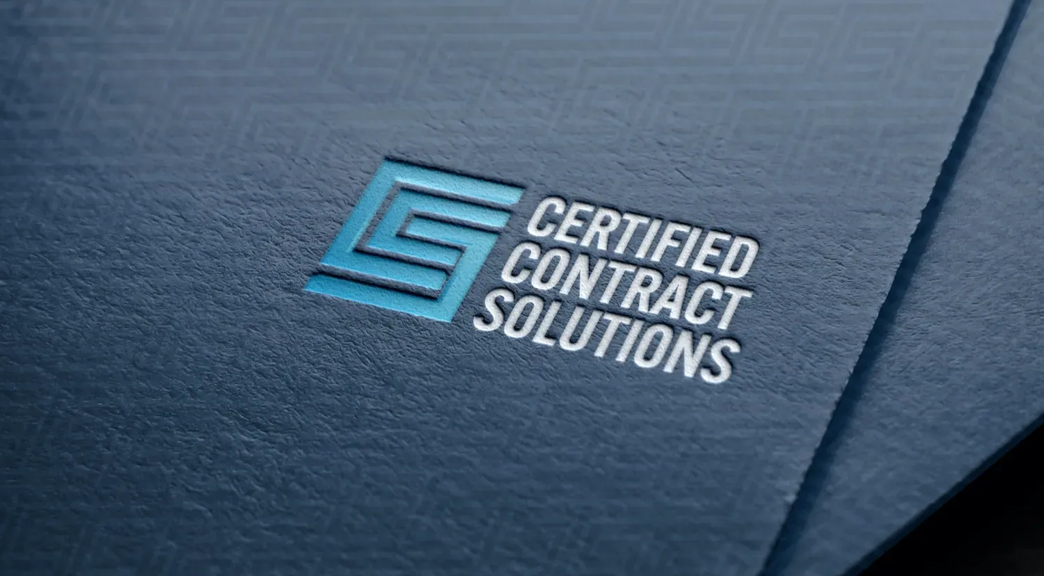 A blue debossed logo for 