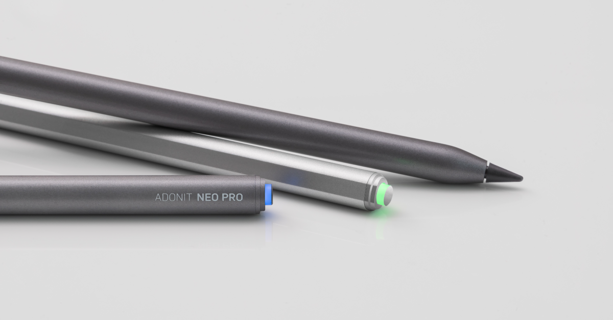 Three digital pens, one grey, one metallic, and one dark grey with a blue tip, arranged on a light grey background.