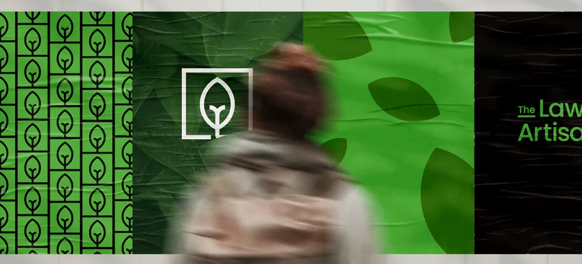 A blurred person stands before a green-themed banner featuring a square leaf logo and the partial text
