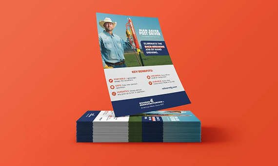 A stack of letterhead paper and two business cards featuring the 