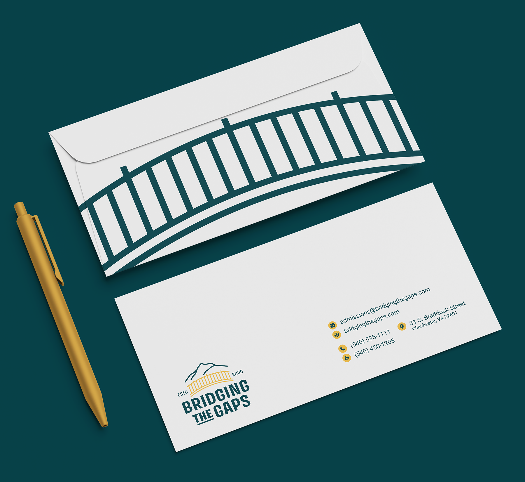 A mockup of a branded envelope with a bridge graphic and contact details