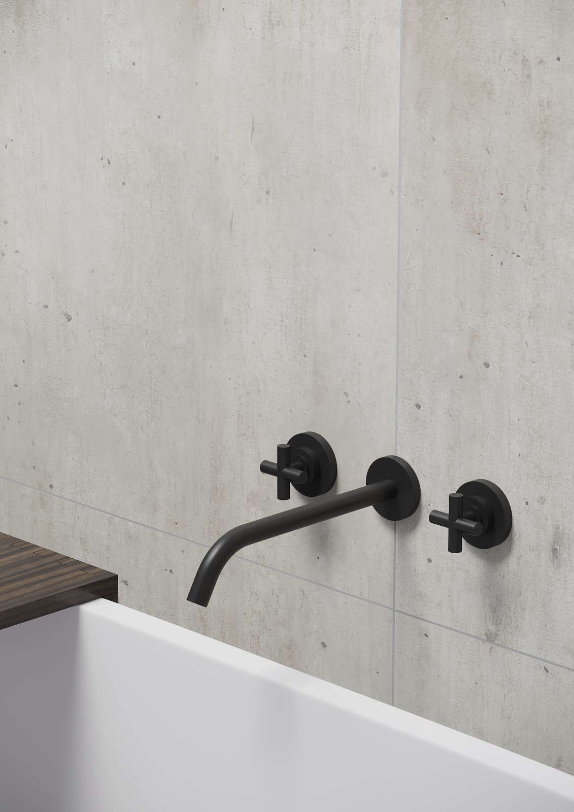 Black faucet and handles on a concrete wall above a white bathtub with a wooden ledge.