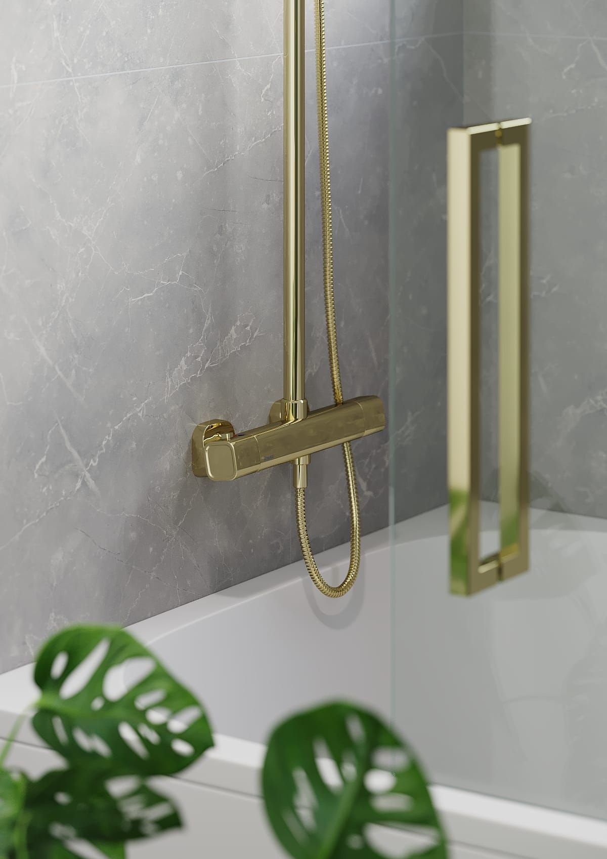 Gold shower fixtures against a gray tiled wall, with a glass shower door and a monstera plant in the foreground.
