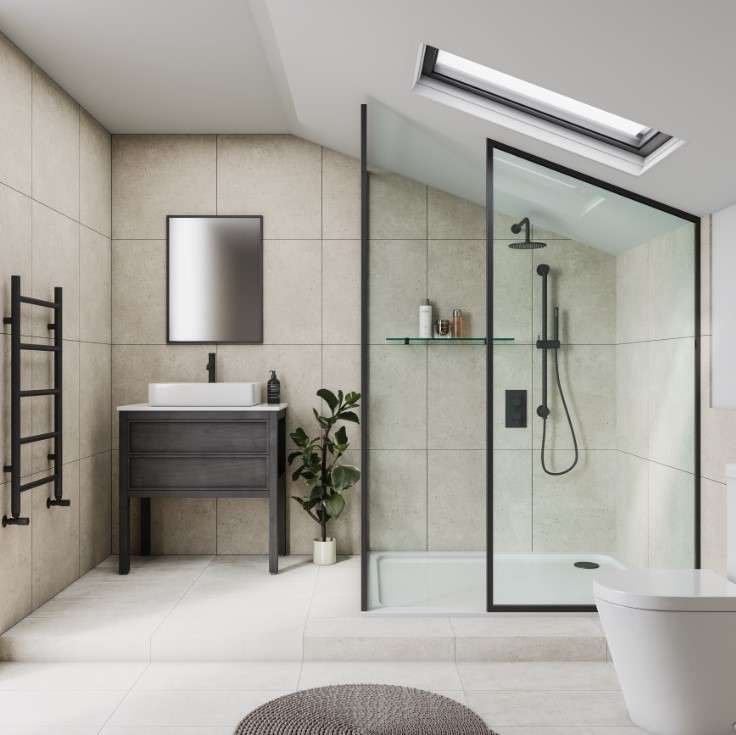 Modern bathroom with shower, vanity, and toilet; beige and black color scheme.