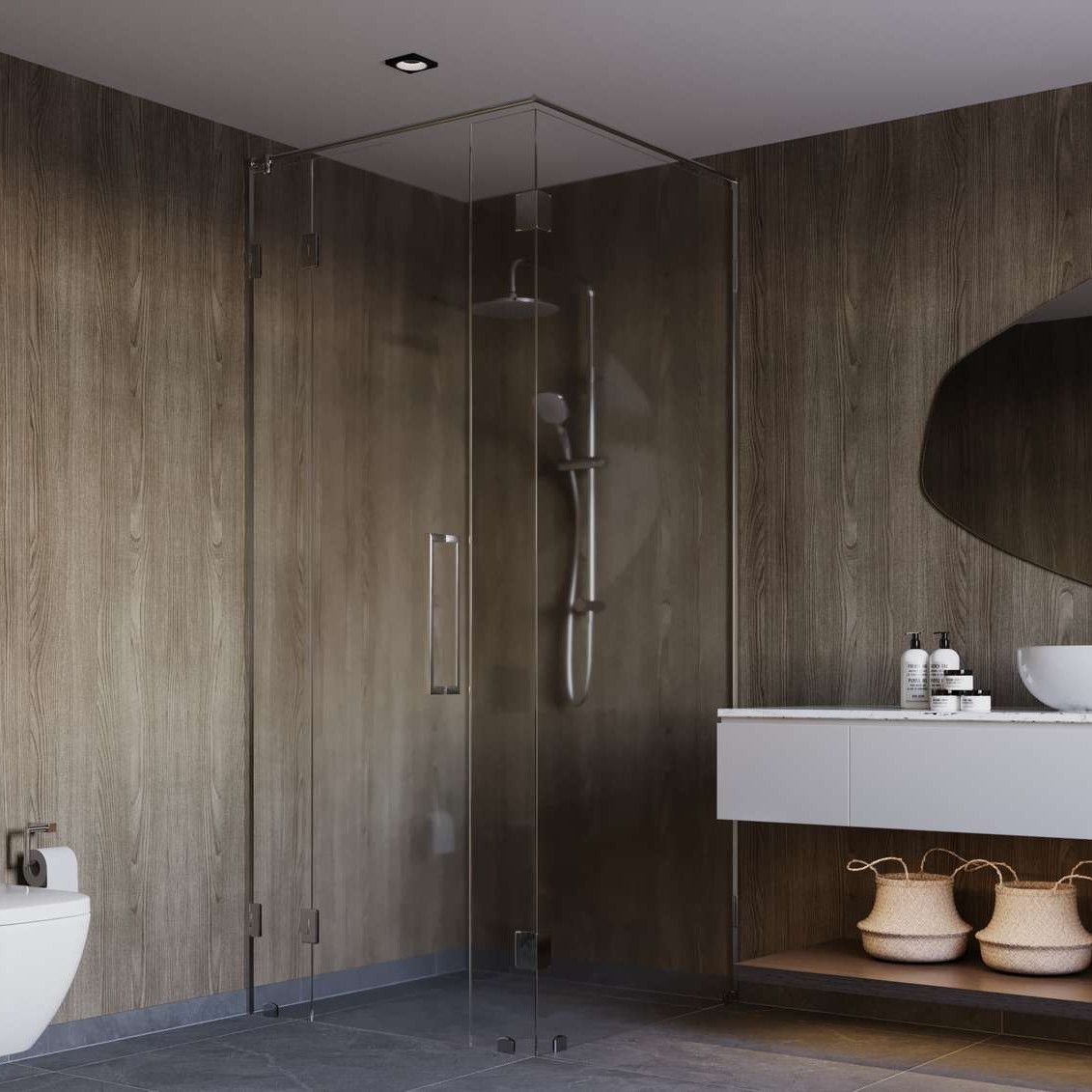 Modern bathroom with glass shower, wooden walls, white vanity, and toilet.