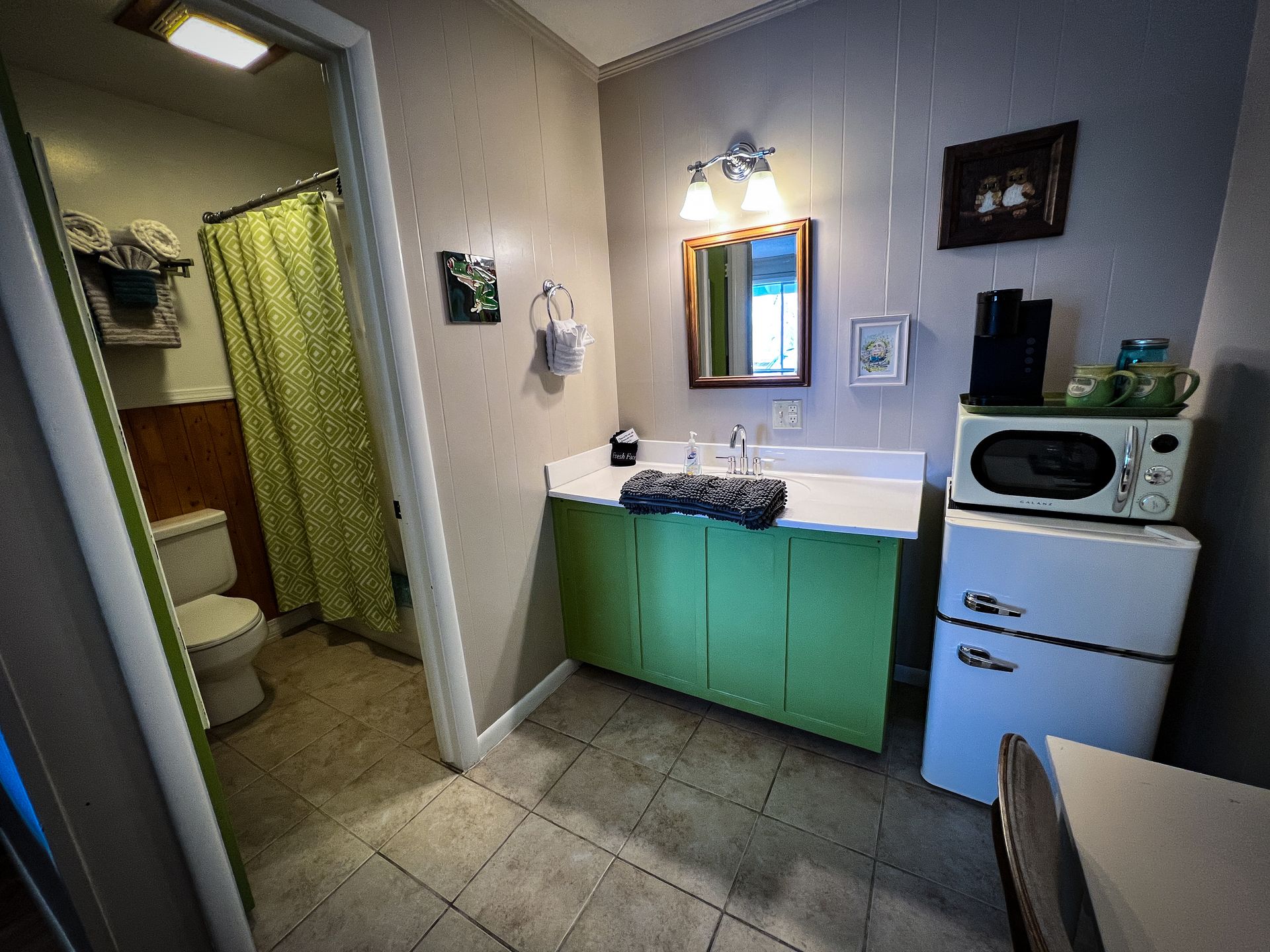 Vanity area of #10 Single Guest Room – The Jungle Room