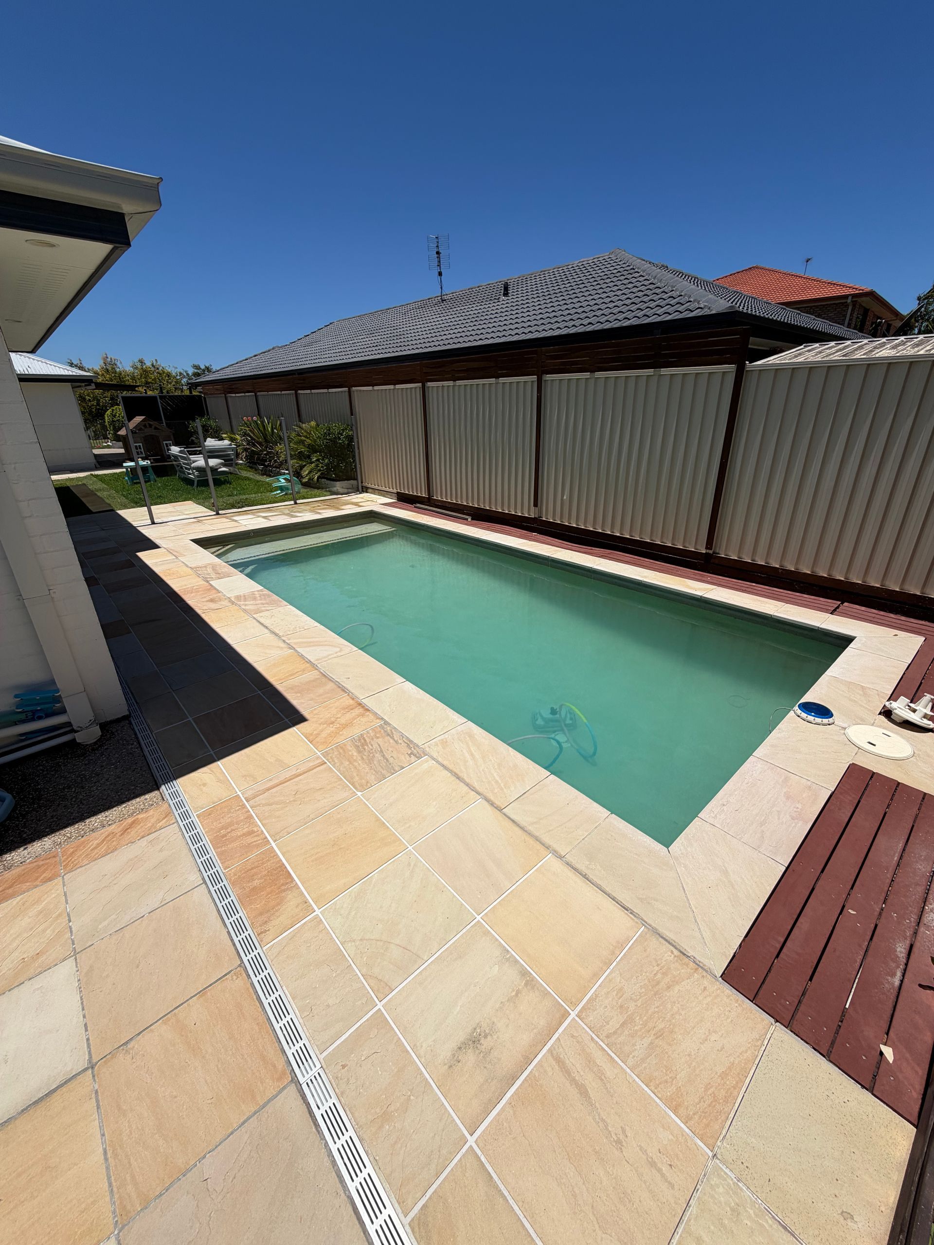 Paved Pathway Next to a Building — Coastal Pressure Solutions in Oxenford, QLD