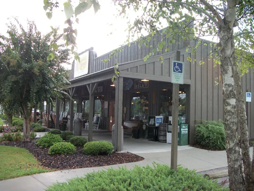 A building with a handicapped sign in front of it
