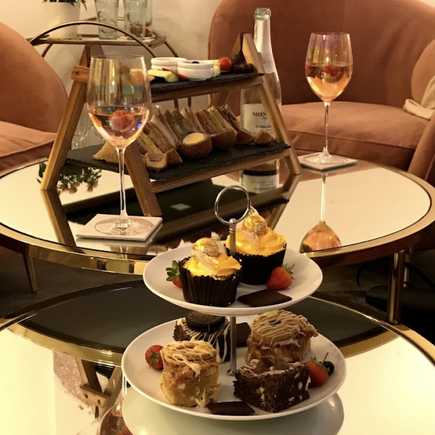 two-tiered-tray-of-desserts-and-a-slate-plate