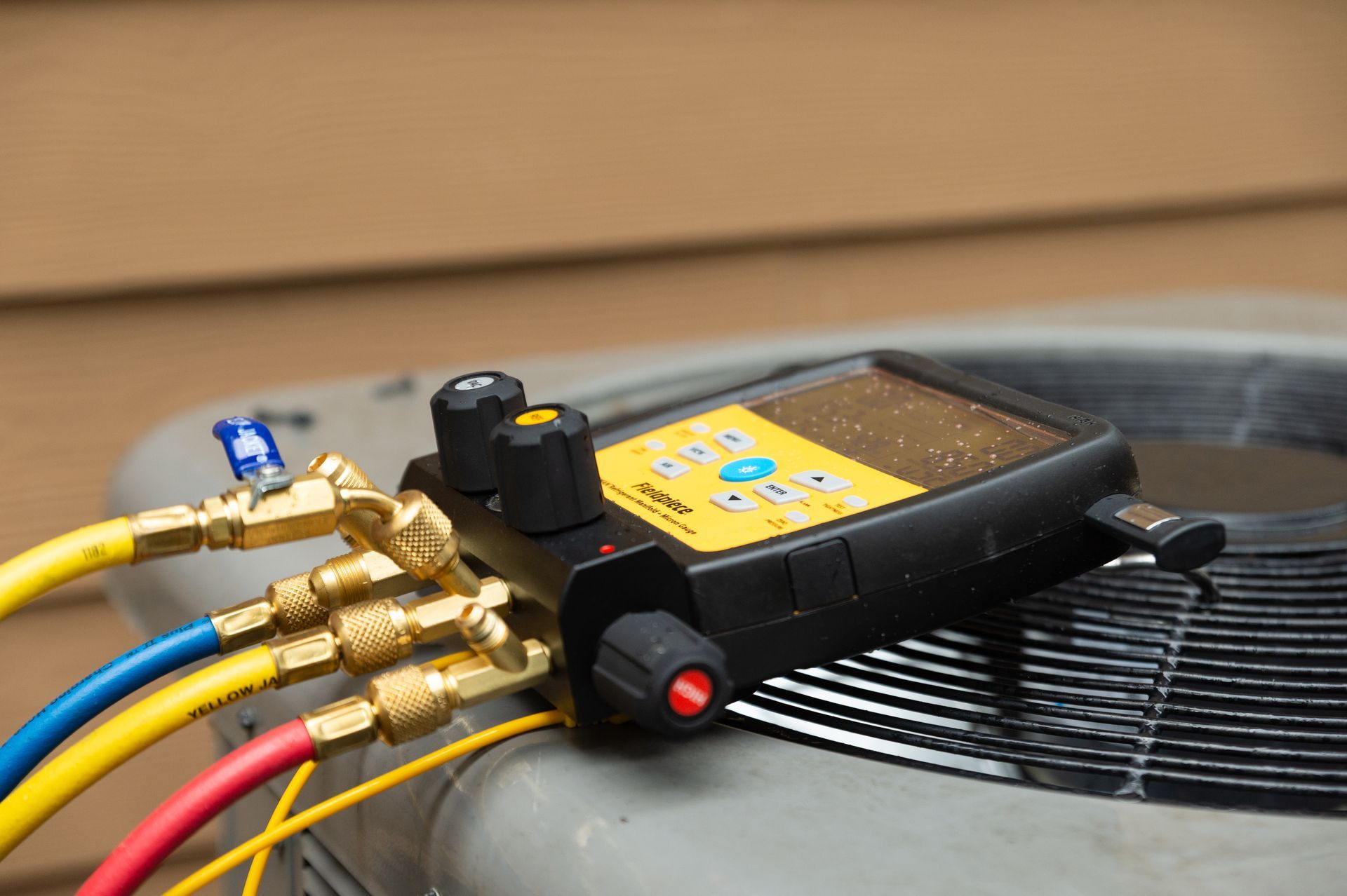 HVAC technician performing heat pump maintenance in Everett
