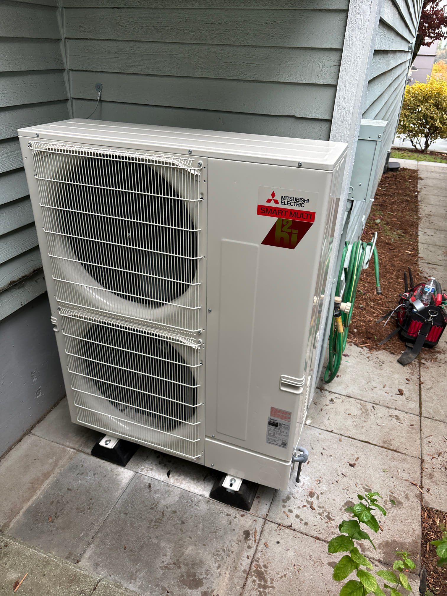 Certified technician working on mini-split system