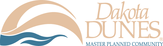 A logo for dakota dunes master planned community