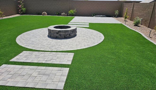 Artificial turf with concrete pavers fire pit
