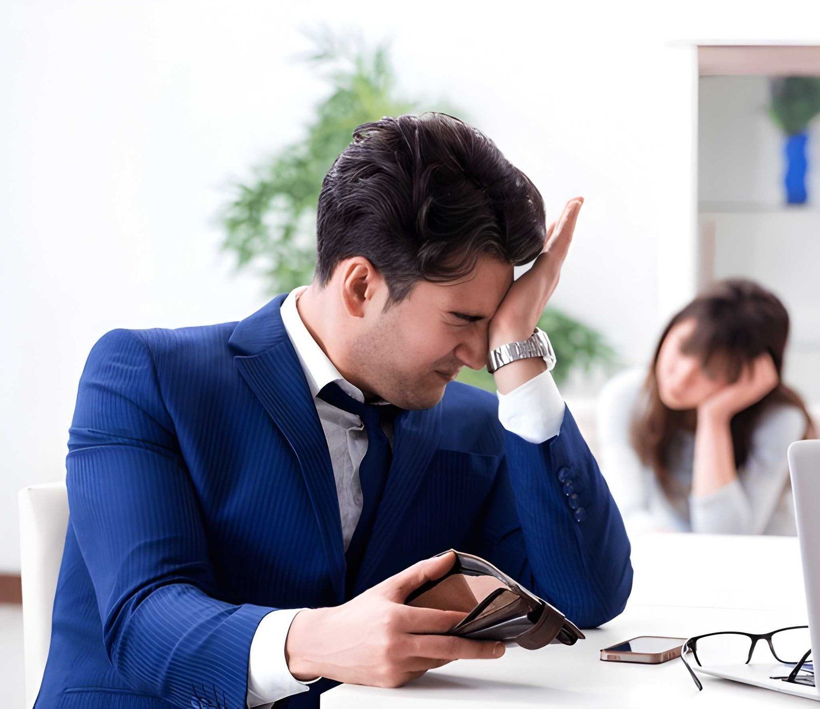 Employee Distressed While Sitting on a Desk — Australian Employee Lawyers in Broadbeach Waters, QLD