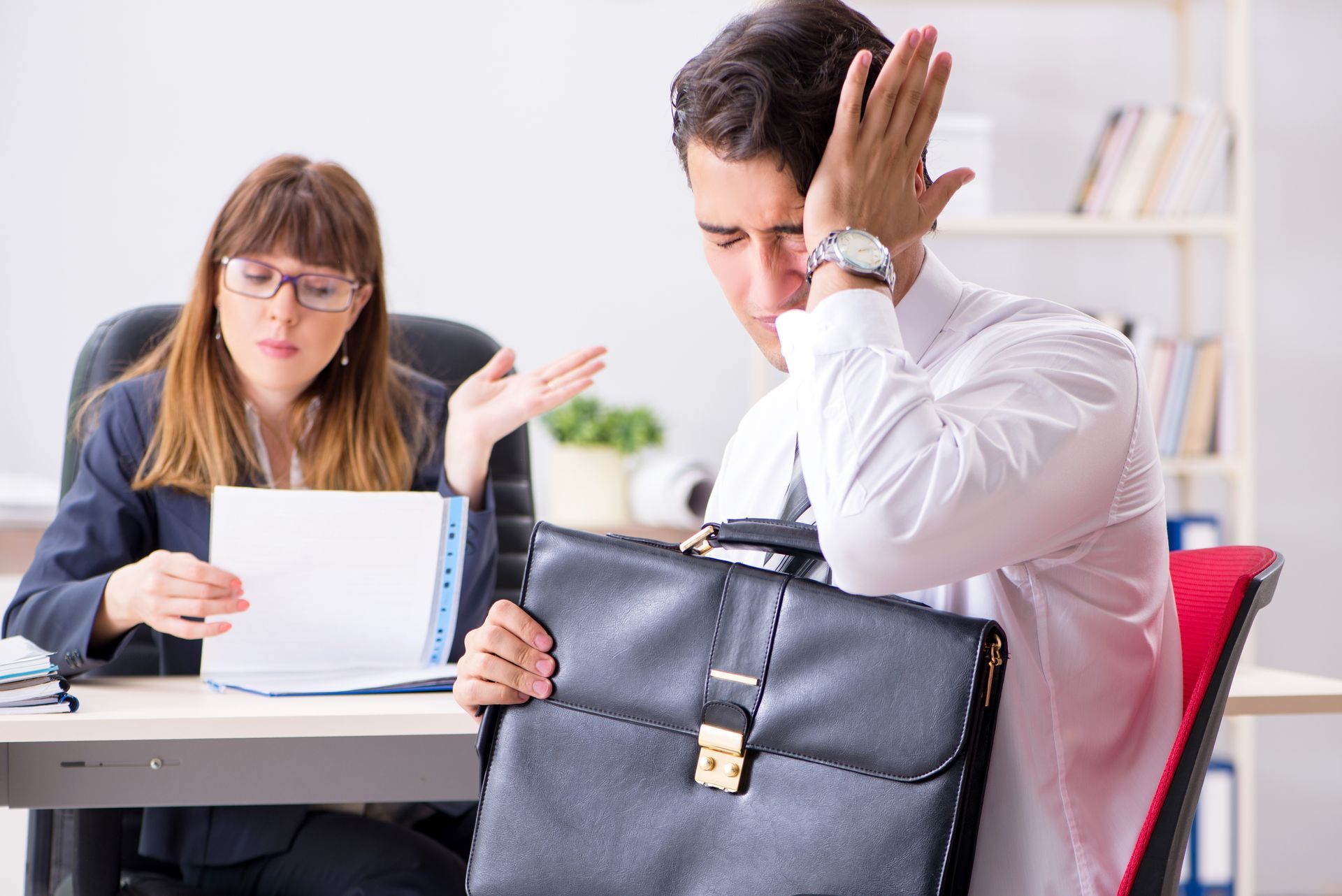 Employee Who Looks Distressed With a Bag — Australian Employee Lawyers in Broadbeach Waters, QLD