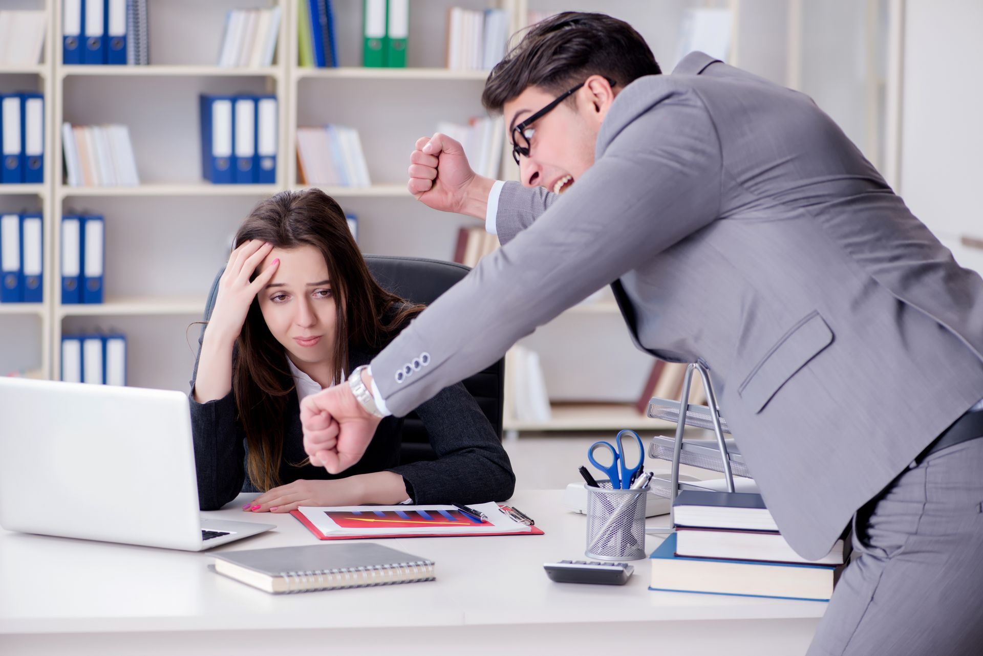 A Manager in a Gray Suit Gestures Angrily on the Employee — Australian Employee Lawyers in Broadbeach Waters, QLD