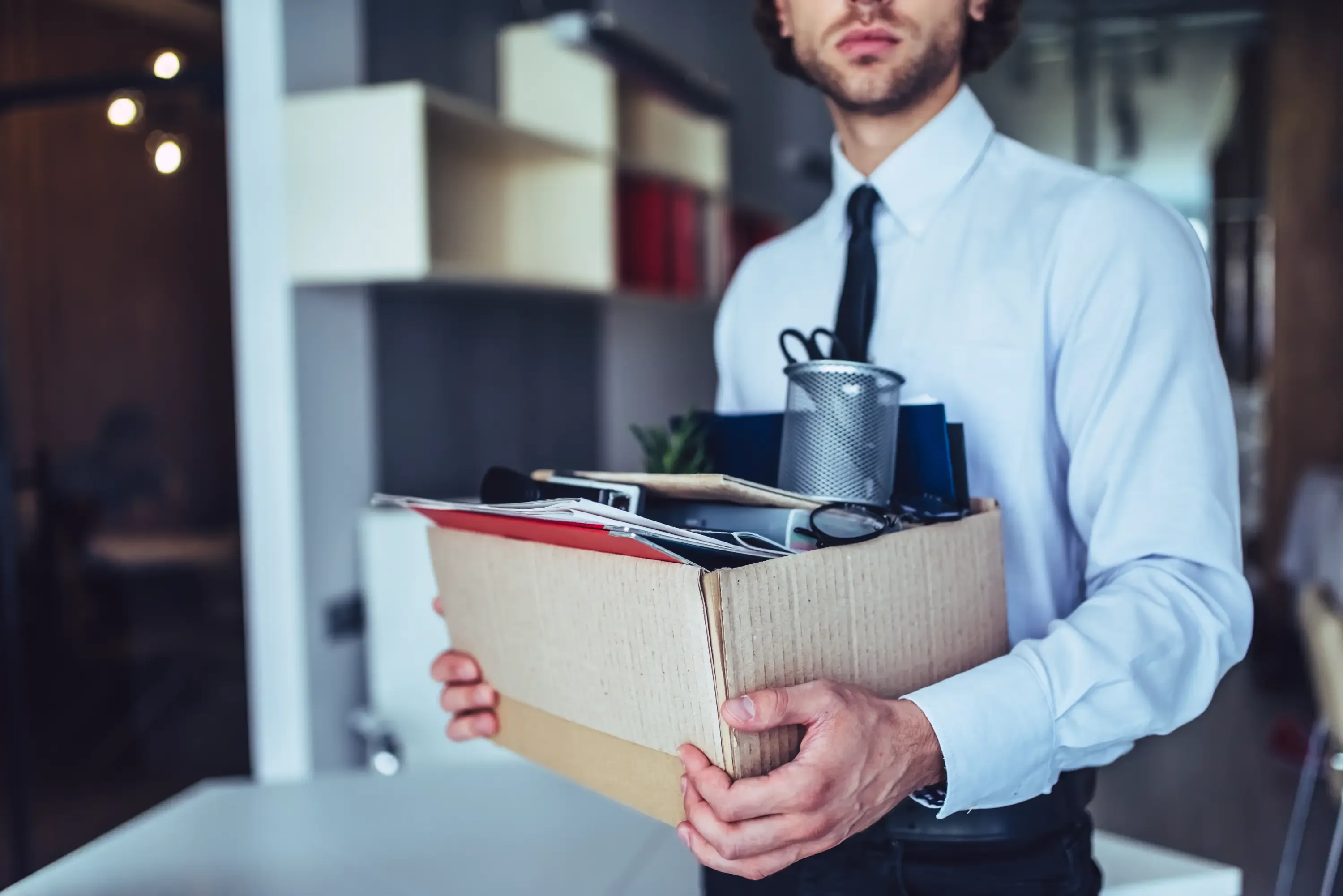 Employee Carries a Cardboard Box Suggesting Job Loss — Australian Employee Lawyers in Broadbeach Waters, QLD