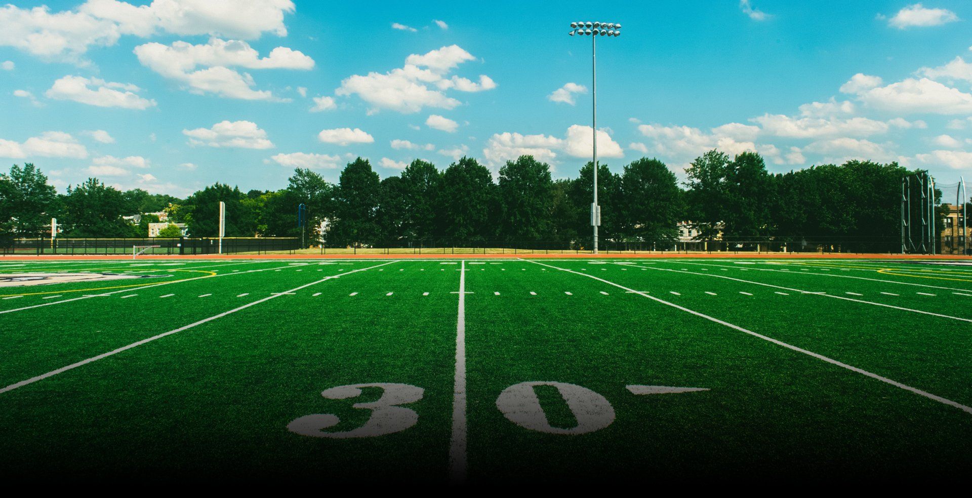 Athletes training on synthetic sports turf