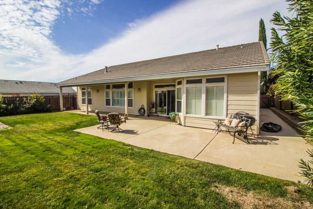 The Backyard of a House With a Patio and Lawn — Better Built Patios & Decking in Kingscliff, NSW