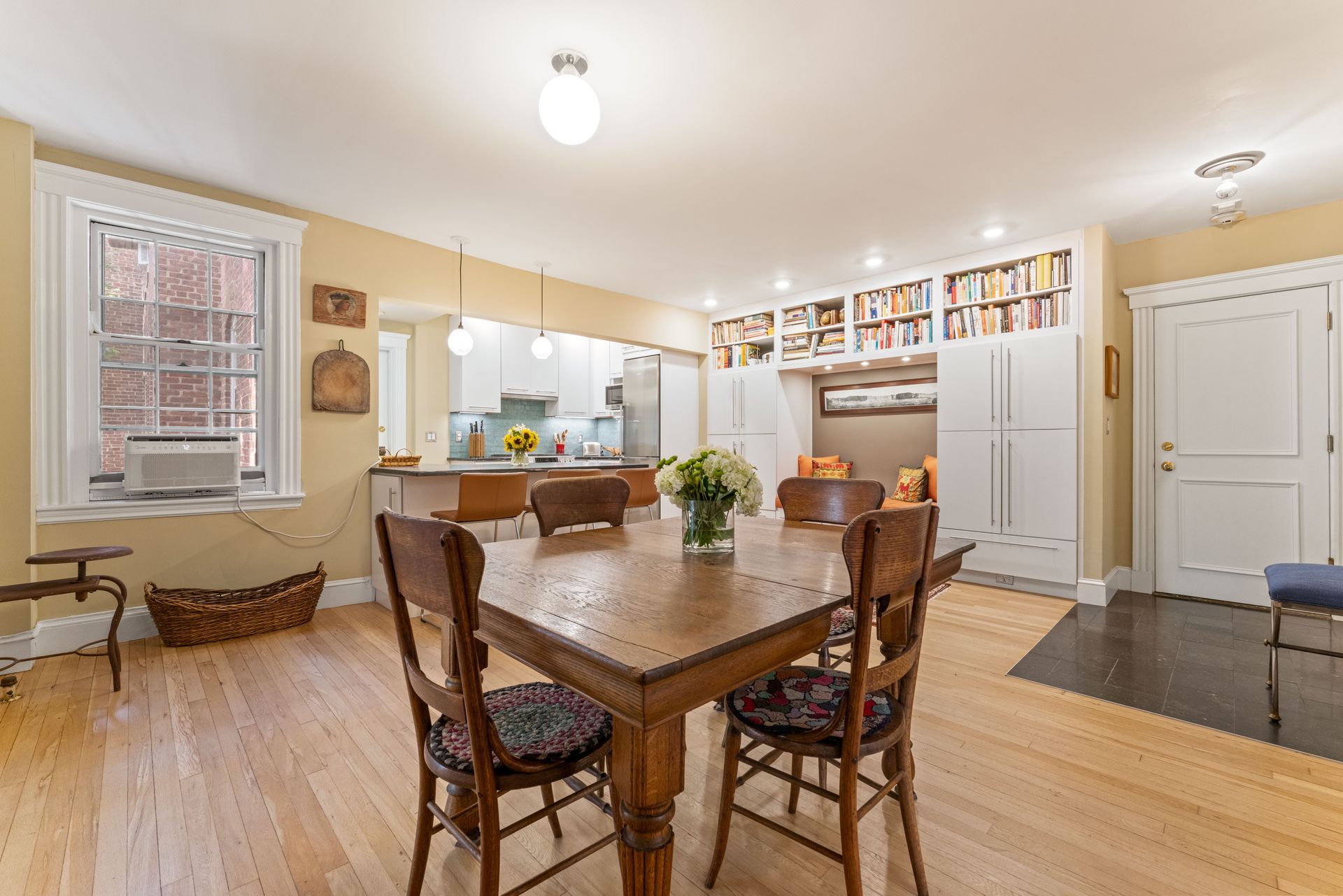 Dining area with reading nook in background