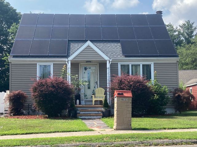 A house with solar panels on the roof