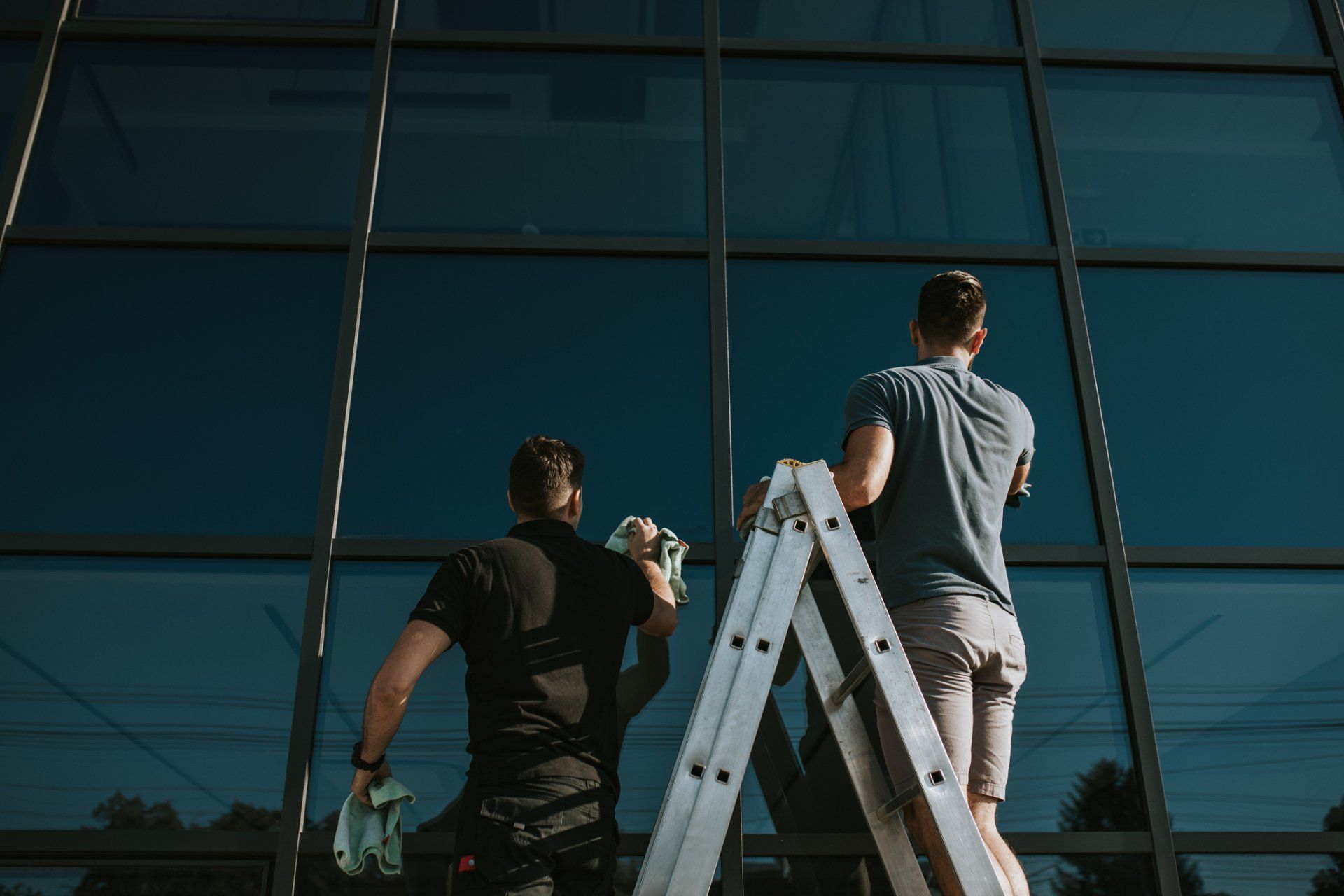 Window Cleaners Working Together – Fargo, ND - Automated Maintenance Services, Inc.