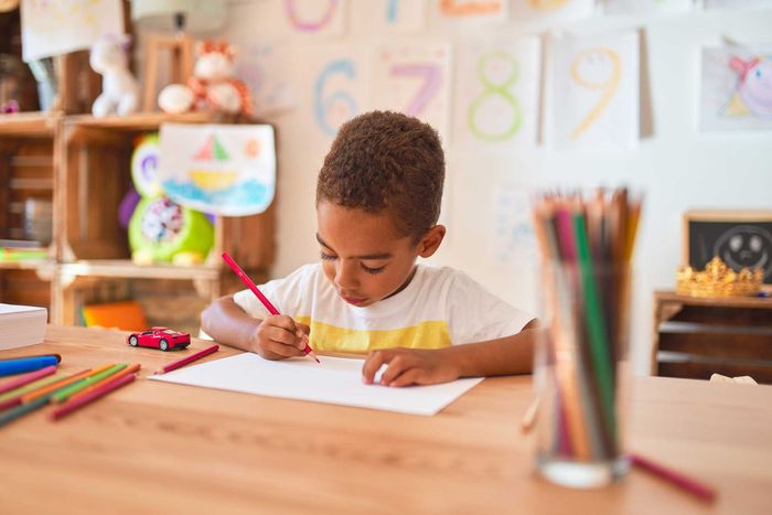 kid learning to draw