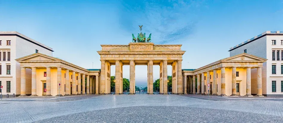 Brandenburg Gate in Berlin, viewed from the front with its neoclassical columns and iconic quadriga sculpture.