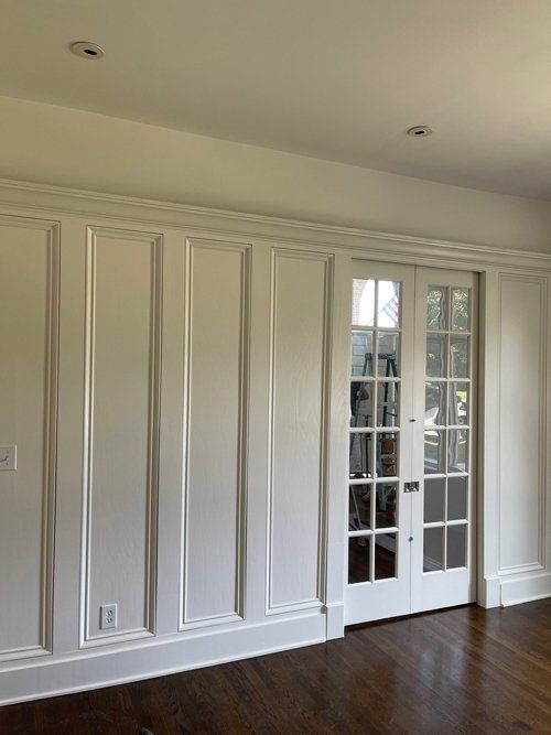 Painting The Wall Using White Paint — Lexington, KY — Hardin Painting Company