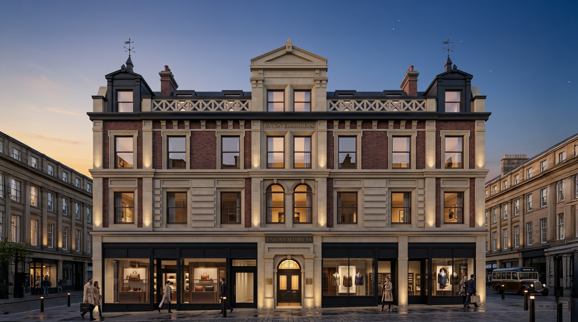 Elegant historic building facade with ornate windows and rooftop statues at dusk