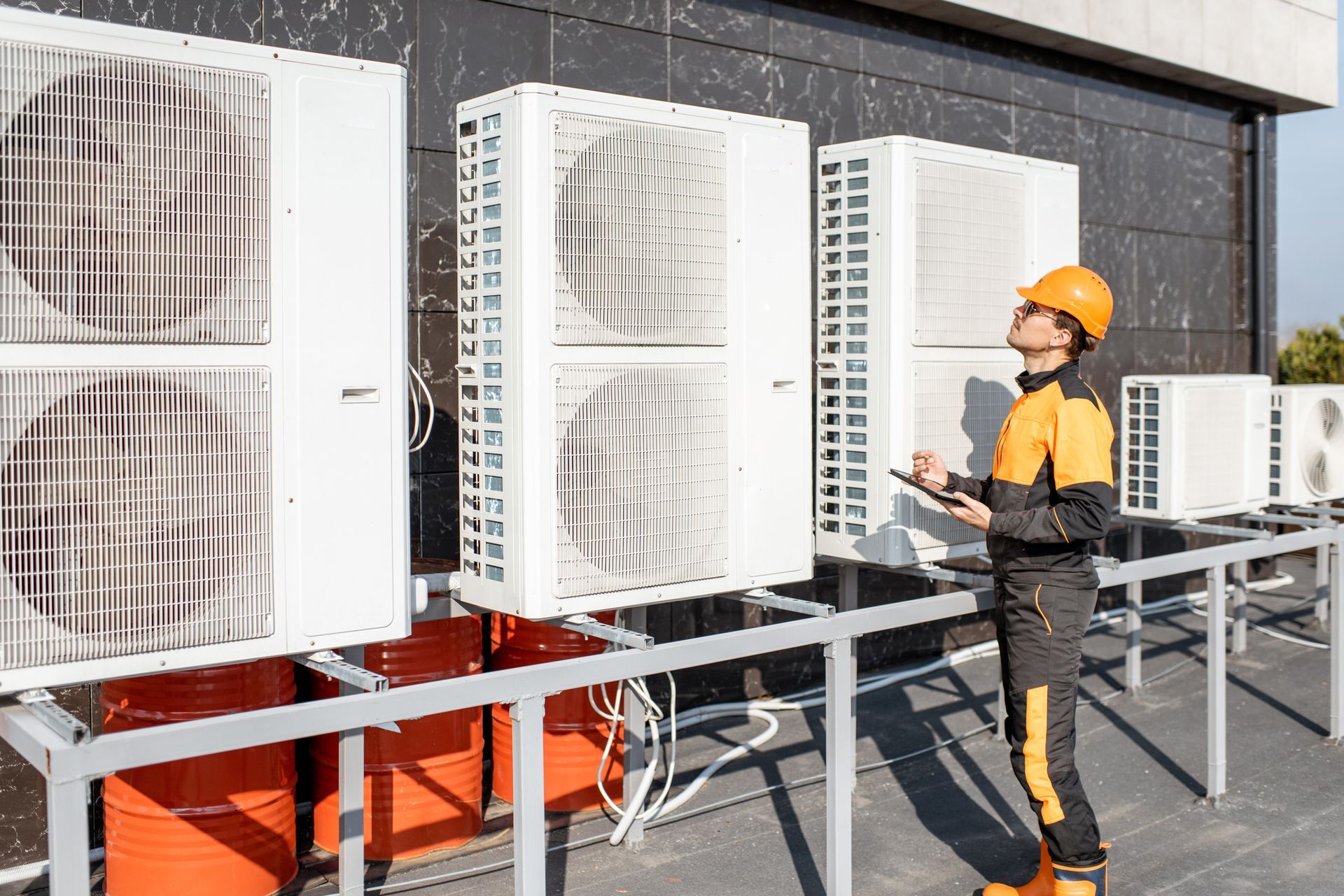 Workman Servicing Air Conditioning — Sydney, NSW — Sharp Conditioning Solutions
