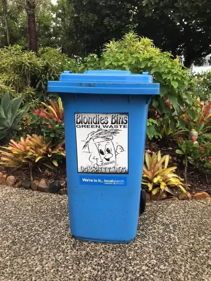 Blue Wheelie Bin With Green Waste Label — Blondies Bins in Shoal Point, QLD