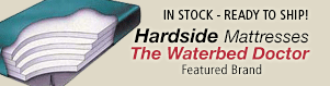 An advertisement for hardside mattresses by the waterbed doctor