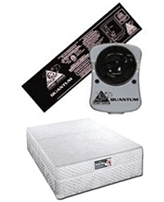 A mattress with a remote control on top of it