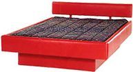 A red bed with a black mattress on a white background.