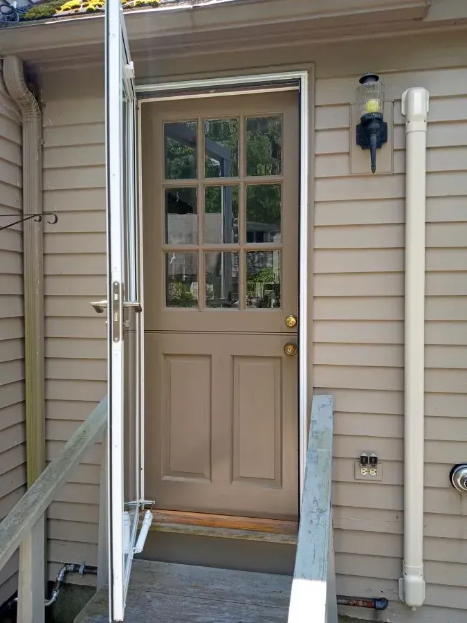 The front door of a house has the number 314 on it